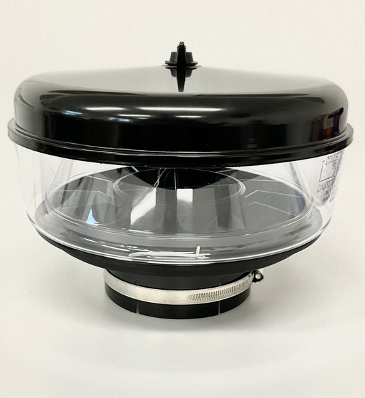 A black clear view pre-cleaner with a circular transparent body, black top cap, and a grey metal clamp near the base, photographed on a plain light background.