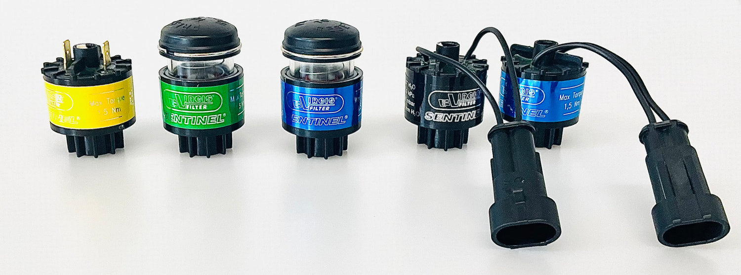 Five cylindrical shape Indicators with 5 different colour labels, order being yellow, green, blue, black and then blue.