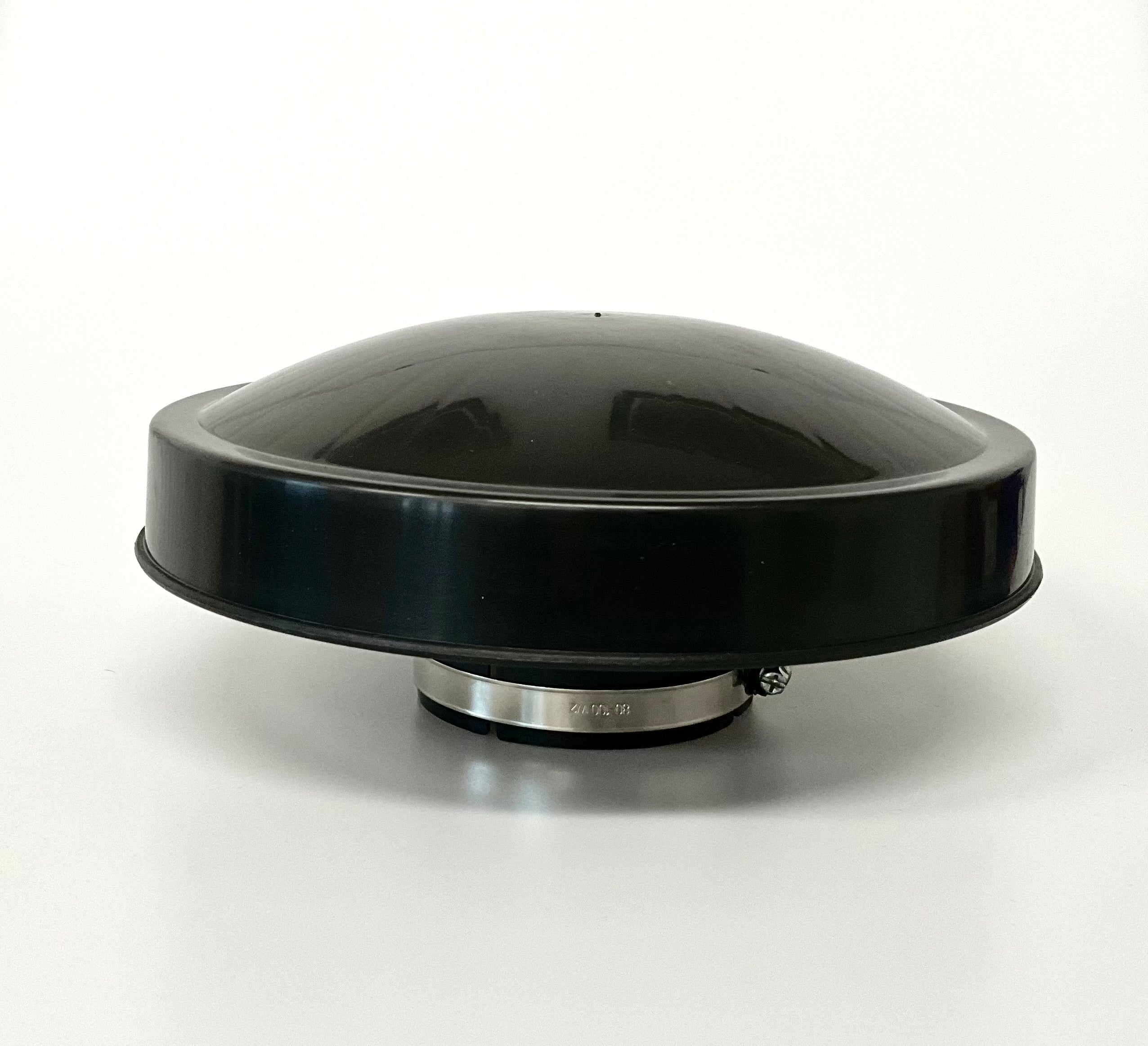 A black dome-shaped rain cap with a grey metal clamp, shown on a neutral light grey background.