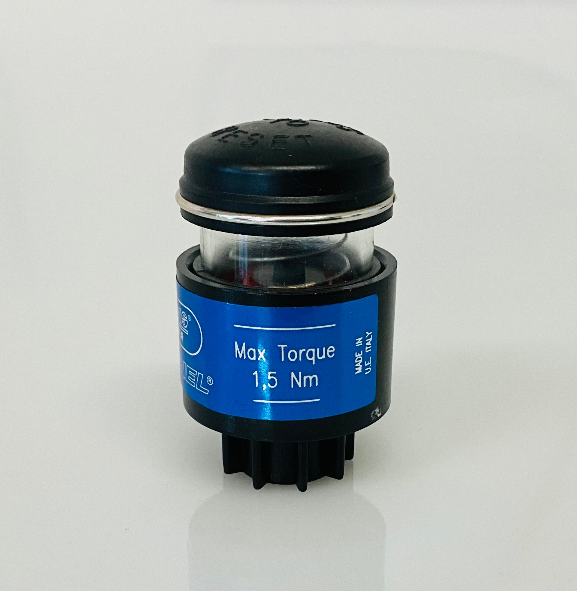 A small black cylindrical optical indicator with press button top, with a blue label reading 'Max Torque 1,5 Nm', 'MADE IN U.E ITALY', photographed on a clean white background.