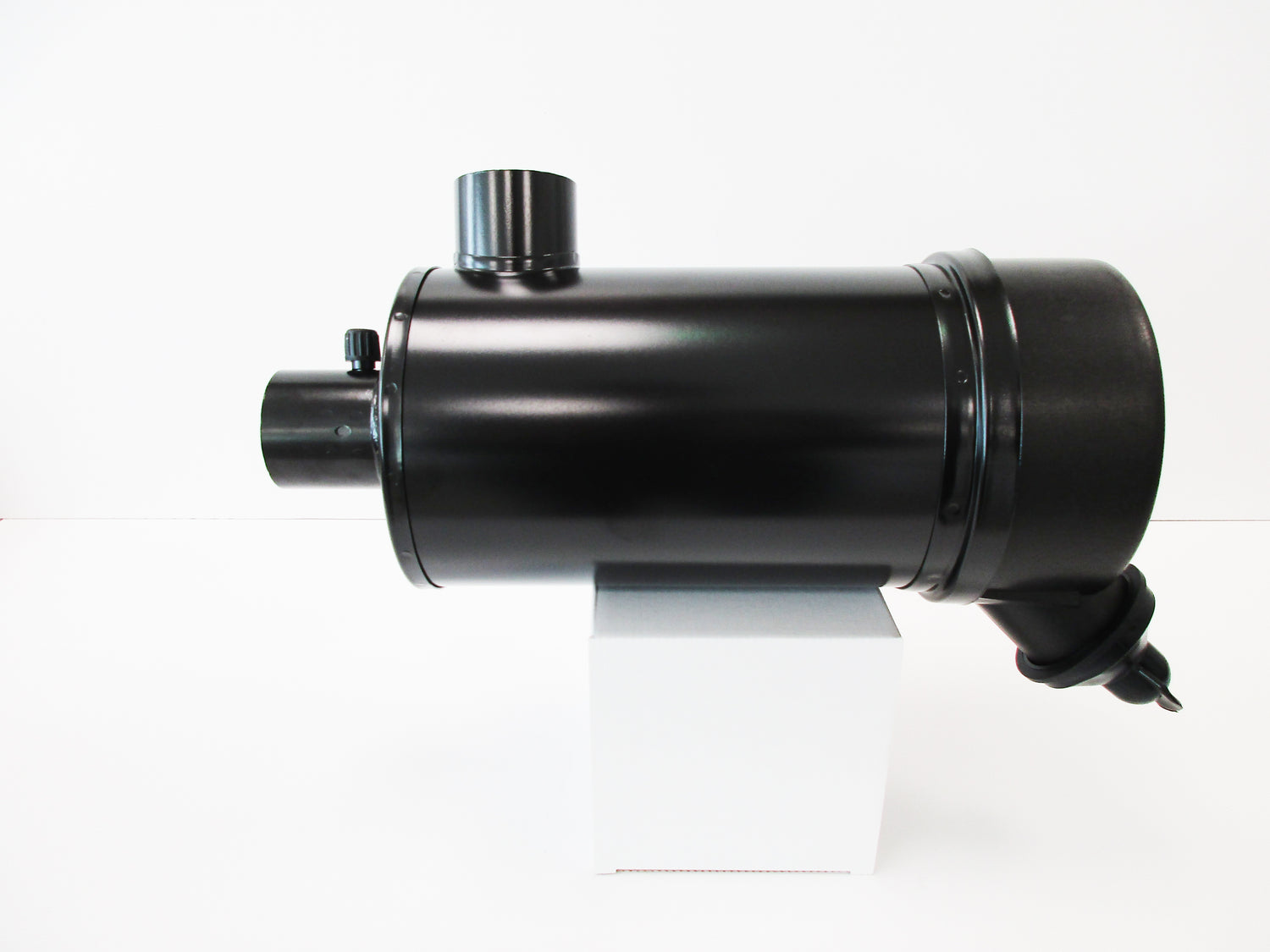A black cylindrical metal bodied air cleaner, displayed on a white box against a white background.